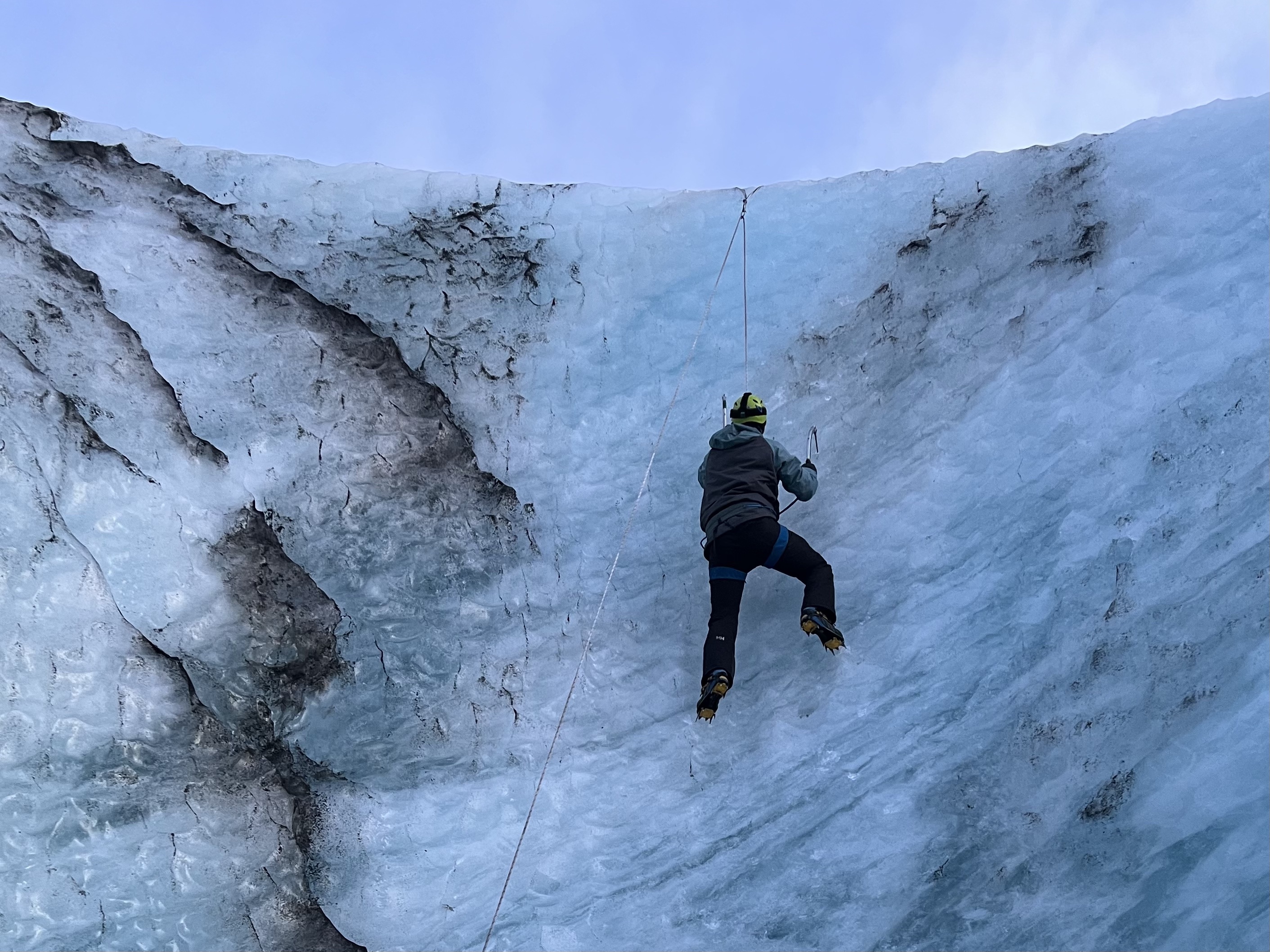 Thomas Swayze scaling ice wall in Iceland