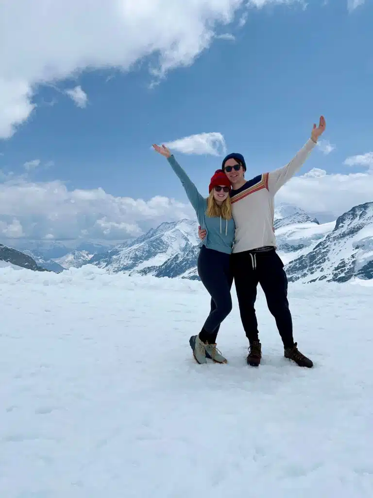 Standing on top of a glacier at Jungfraujoch in Jungfrau region of Switzerland in Spring 2023. Jungfrau is easily accessible from Interlaken. 