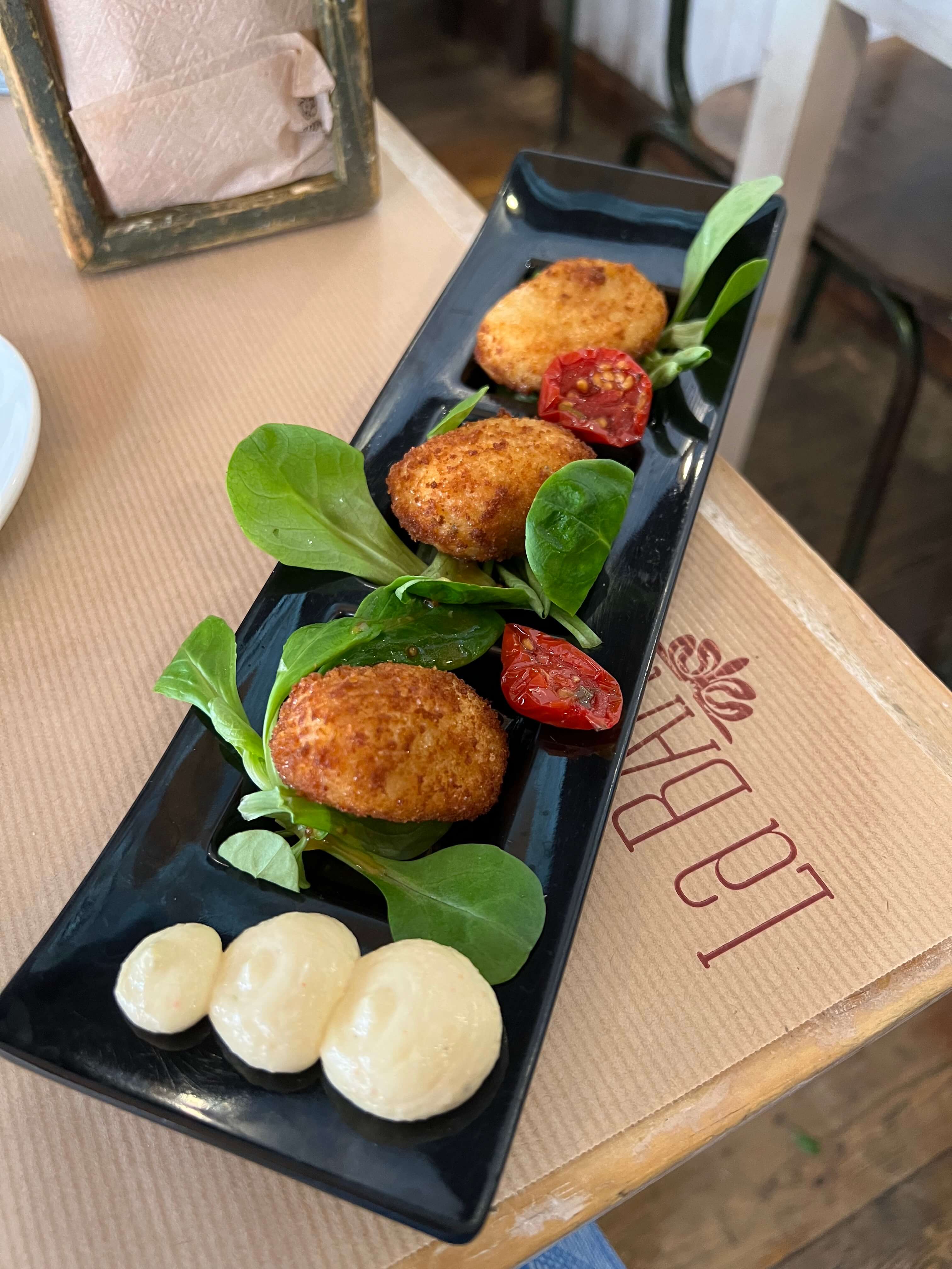 Croquettes at La Bartola, which was recommended by ChatGPT for our Algarve to Seville day trip