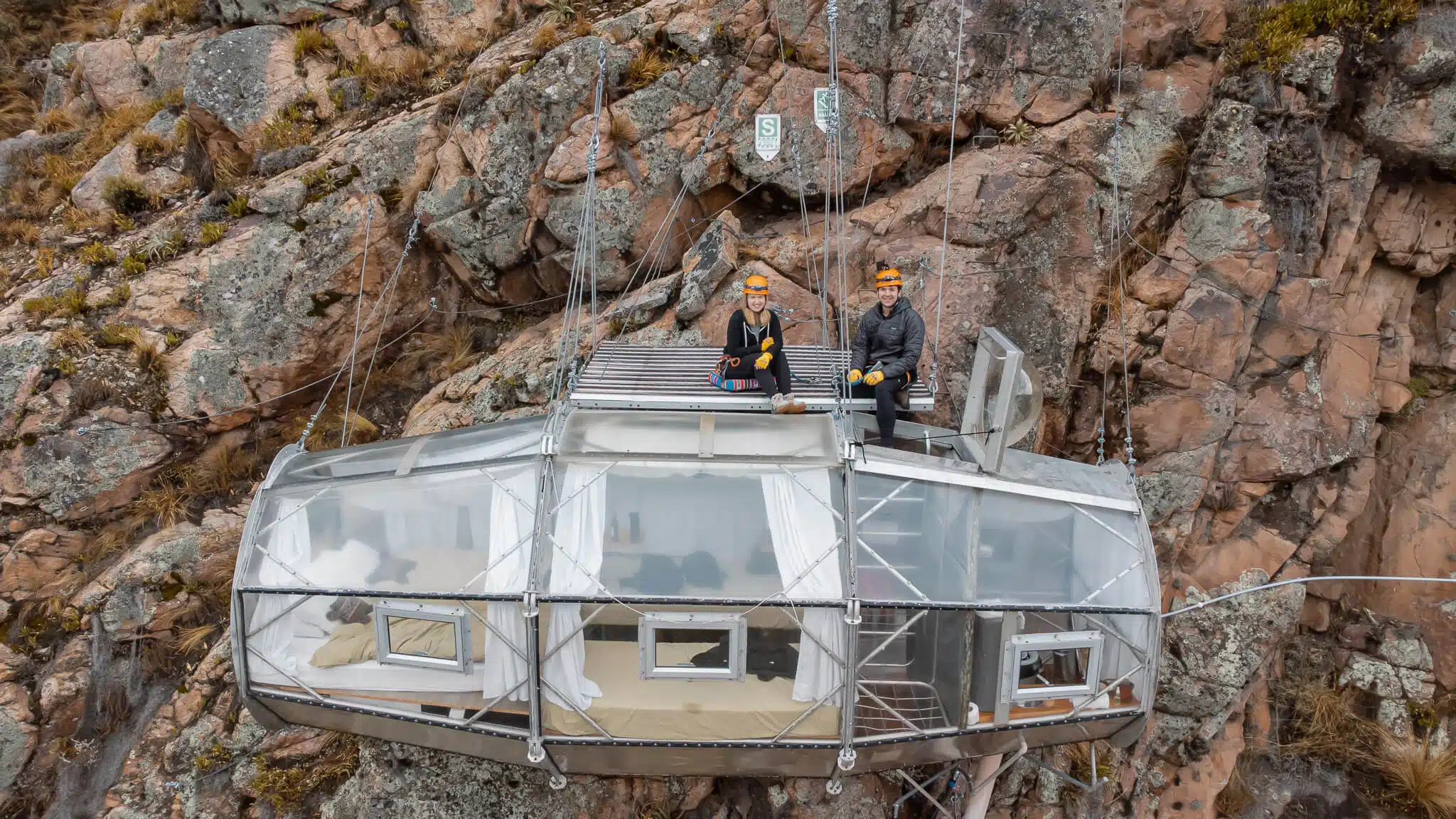 Drone shot of the author and her husband on top of their pod at Skylodge Adventure Suites in Peru