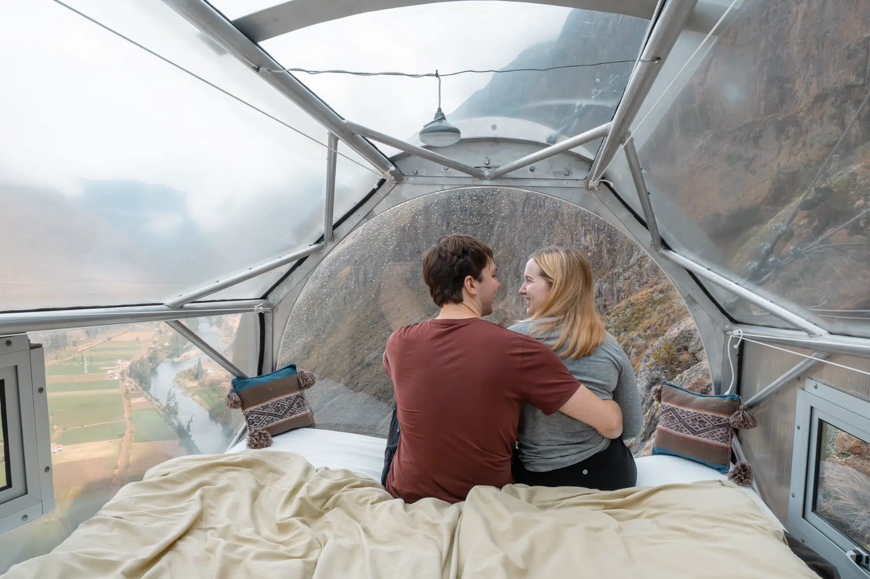 The author and her husband inside their glass pod at Skylodge Adventure Suites in Sacred Valley, Peru