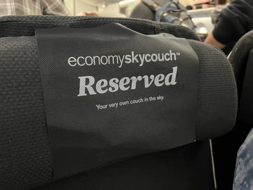 Headrest to a seat in a Skycouch row on Air New Zealand 