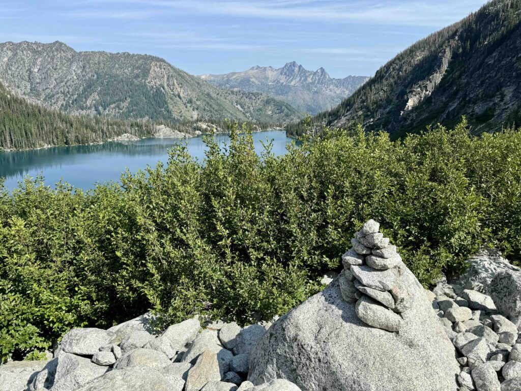 Cairn rock stack overlooking Colchuck Lake on the Enchantments Thru Hike