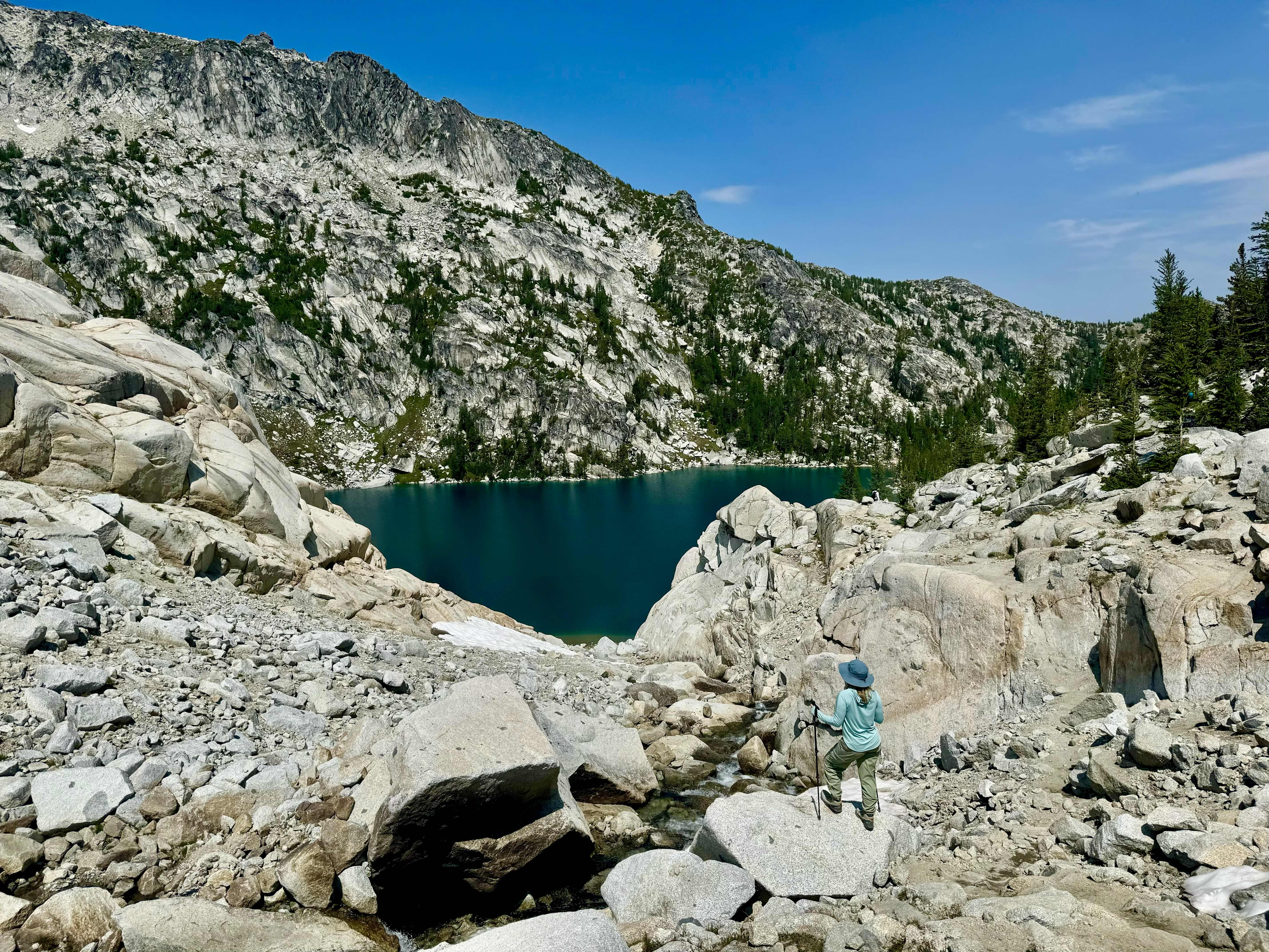 girl overlooking Inspiration Lake on the Enchantments thru hike