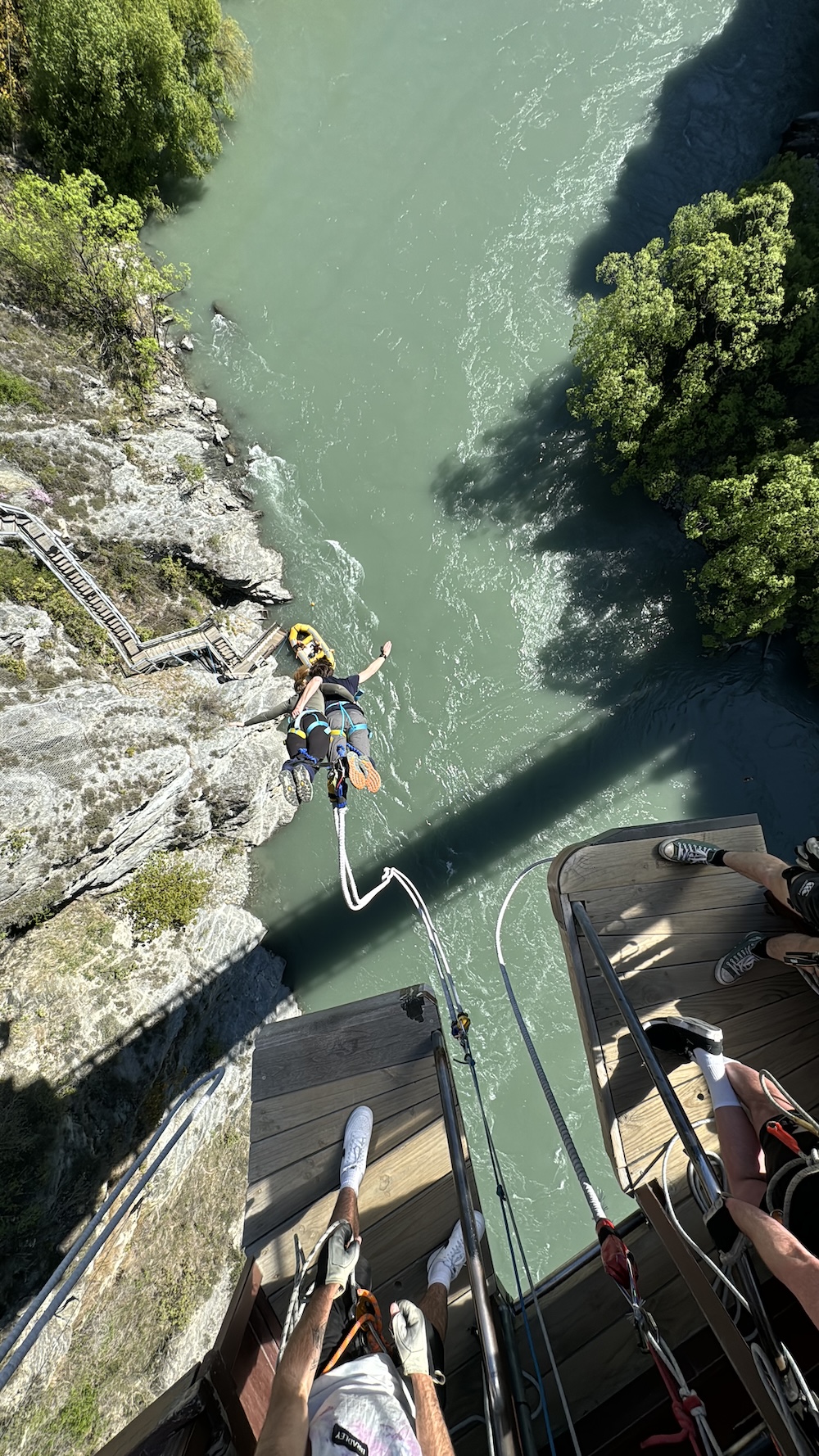 The author and her husband tandem jumping off the Kawarau Bridge Bungy as seen from the platform