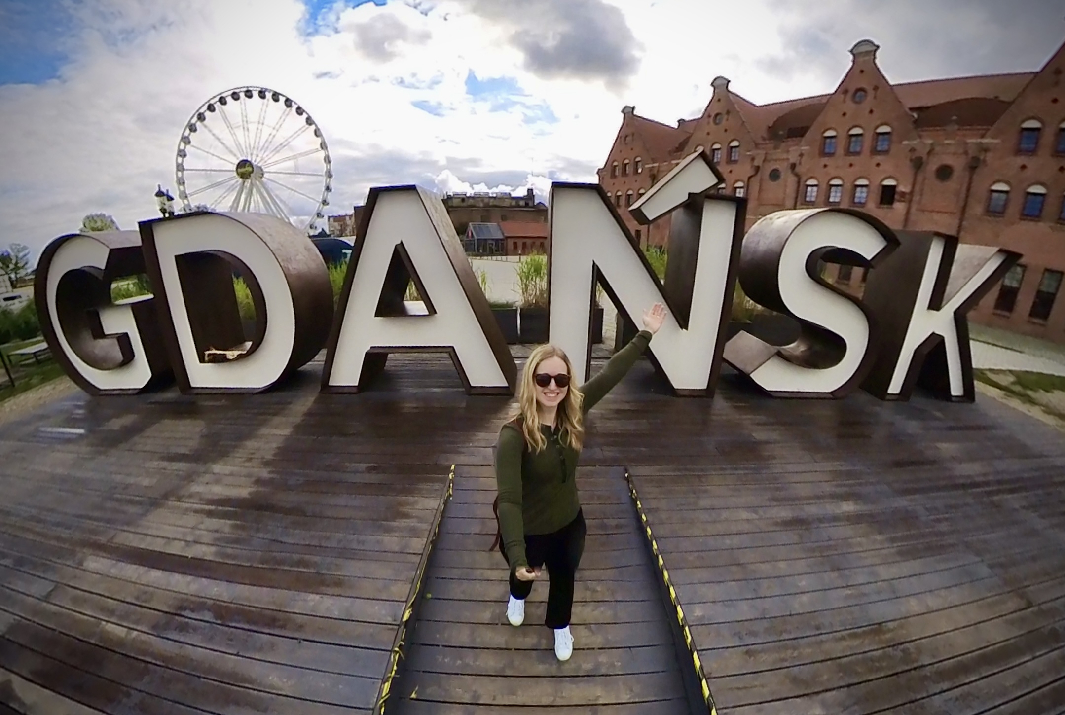 The author in front of the Gdansk sign in Poland