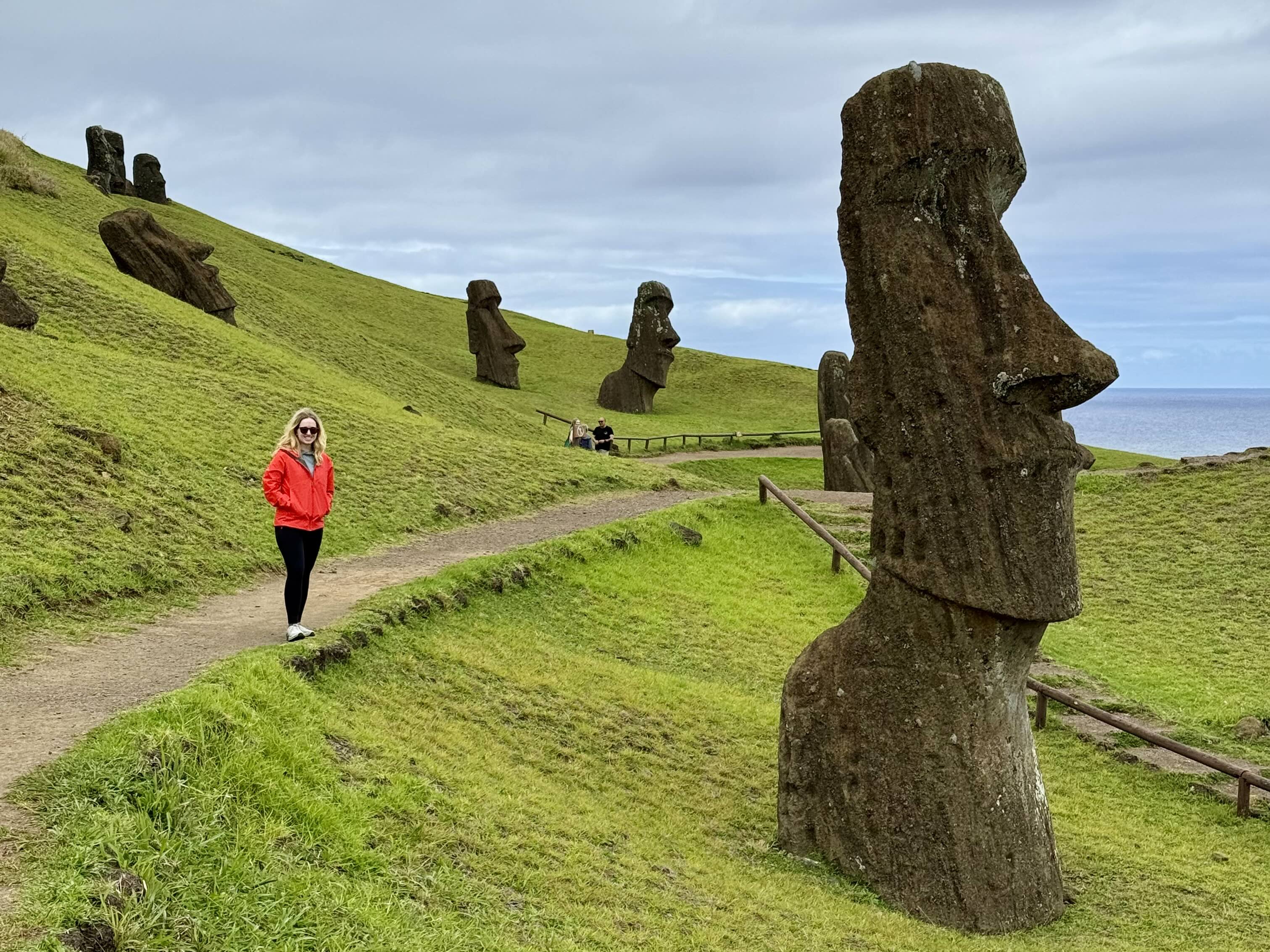 The author next to Moai statues in the Rano Raraku quarry