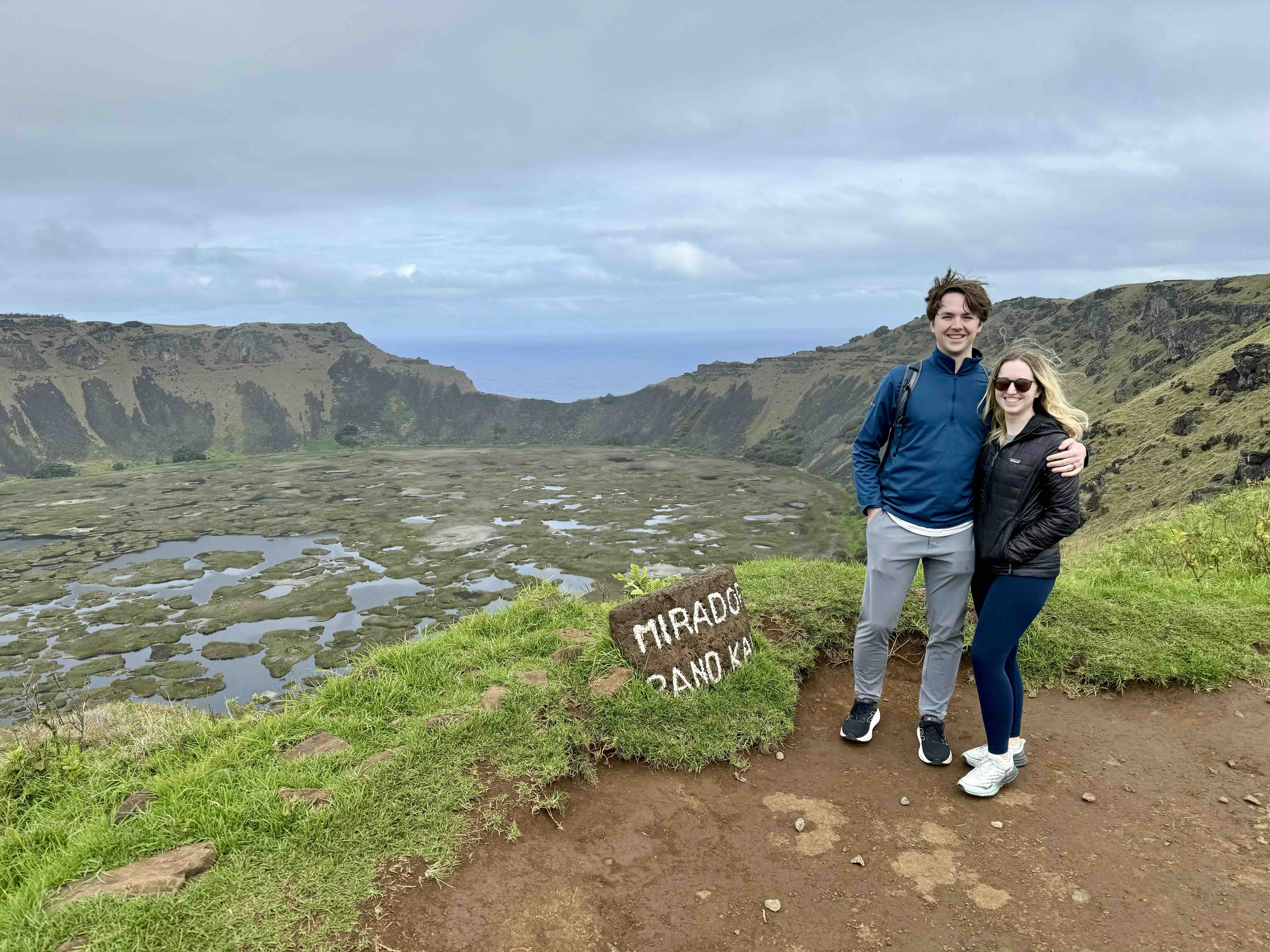 The author and her husband in front of a large crater on Easter Island