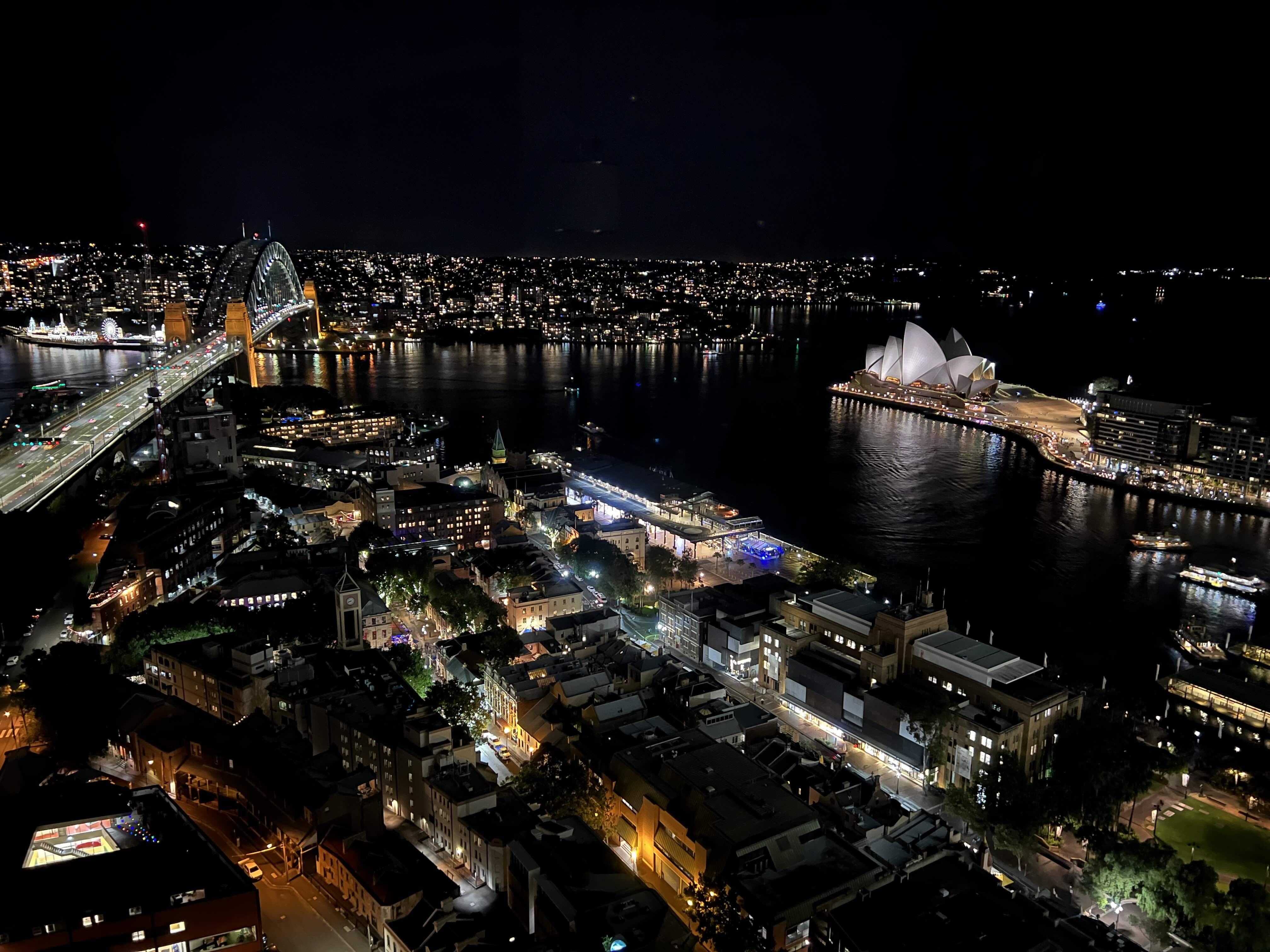 Sydney Harbour at night with the Sydney Harbour bridge and opera house