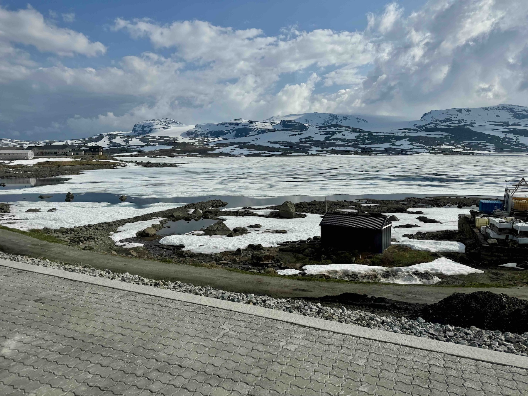 frozen lake in June near Finse, Norway 