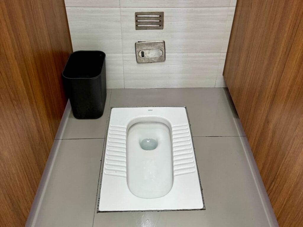 squat toilet in Forbidden City in Beijing, China